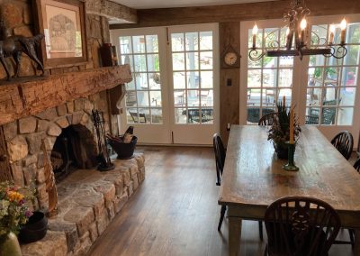 dining room with fireplace historic banner elk rental